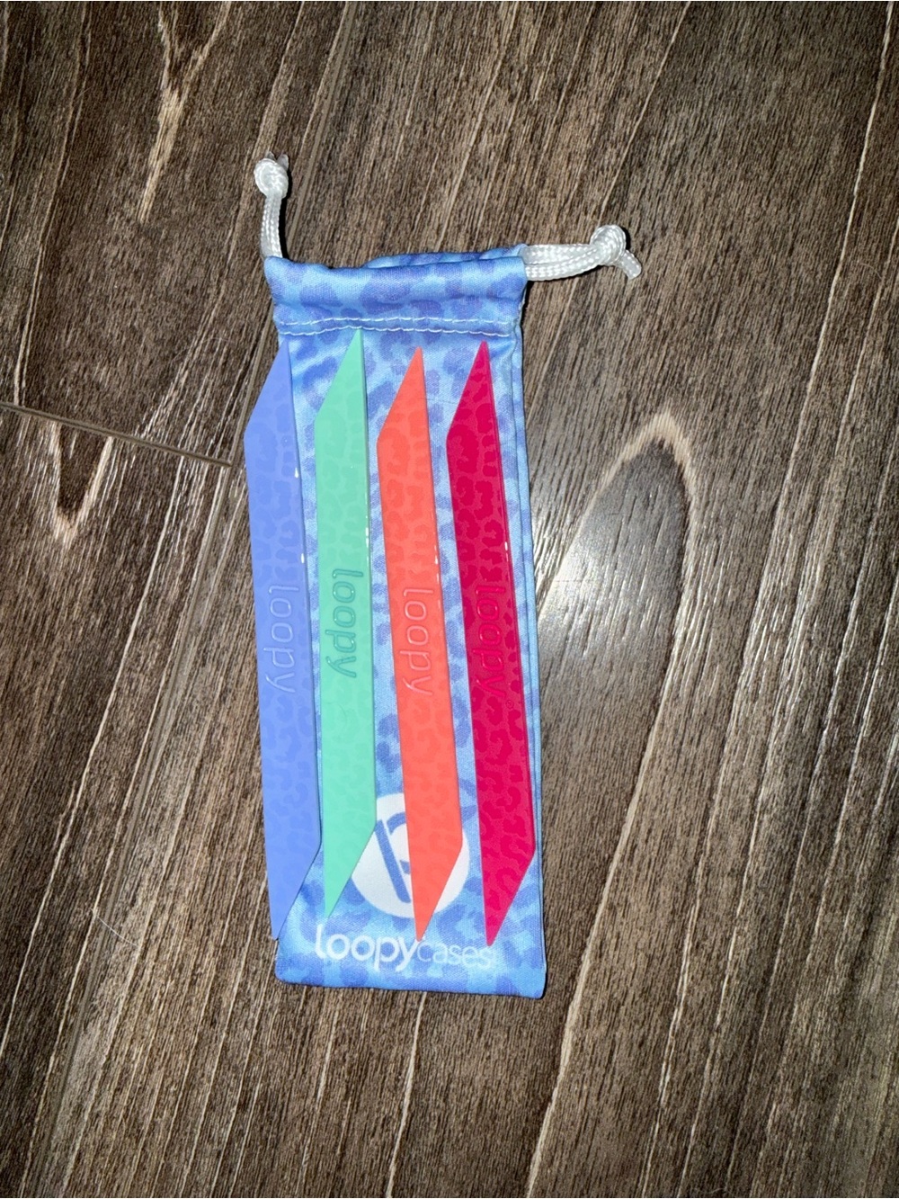 Loopy Case silicone strap set in blue, mint, coral, and magenta